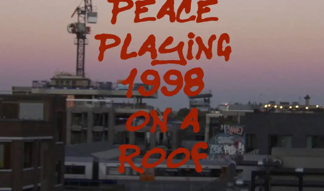 Screenshot from Peace Playing 1998 On A Roof © 2019