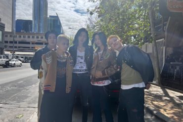 Jack, Mikey, LØREN, June & Leeoh (left to right) on Austin's iconic 6th Street after closing out their first ever American shows © Freya Rinaldi, March 2023